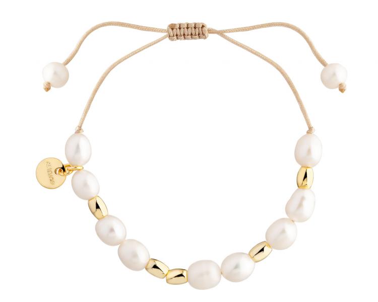 Bracelet with gold plated brass elements and pearls